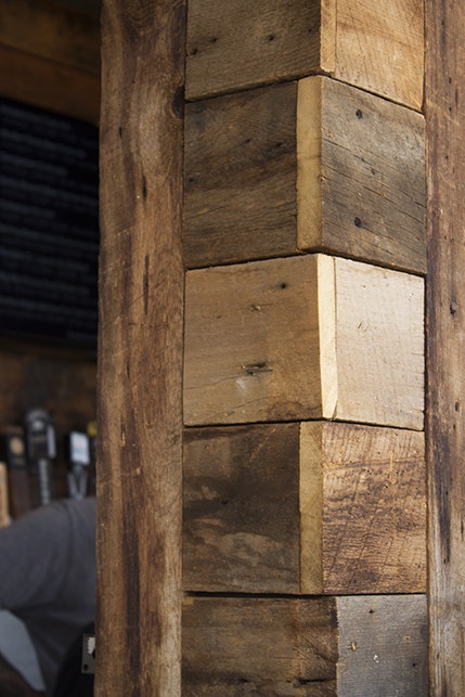 A closeup of the wooden details in the custom bar area